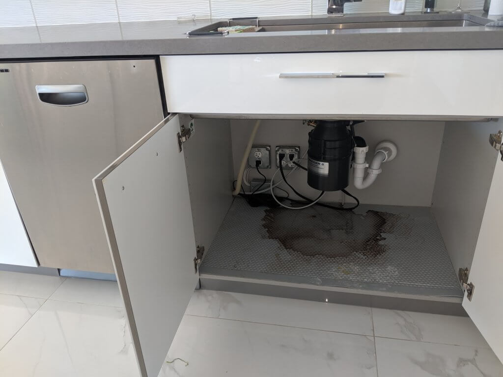 Leaky garbage disposal Delray Beach