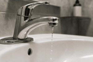 Low water pressure one faucet in a bathroom sink